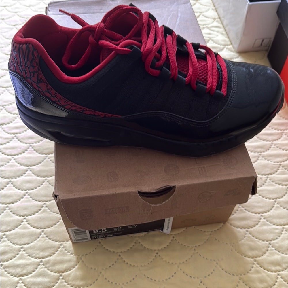 Nike Black and Red Sneakers with Bold Design